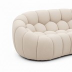 Close-up of the rounded arm and side quilting on the Cielmont Ardin Sofa