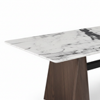 Nocturne Marble Dining Table tabletop detail, white marble edge, veining and dark wood pedestal