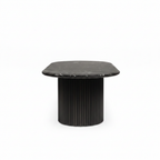 Savoy Oval Marble Dining Table in a 90-degree side profile on a white background