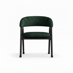 Delphine Dining Chair in deep green upholstery and dark wood, straight front view on white background