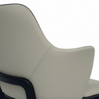 Julienne Dining Chair sculpted backrest, arm, seam, and dark piping detail on white background