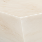 Close-up detail of Arvessa Coffee Table natural stone surface texture and geometric tapered edge profile