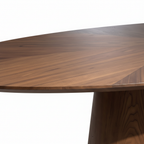 Close-up of the Valora Wood Dining Table dark brown wood tabletop edge and grain