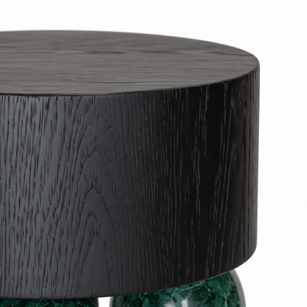 Close-up of the black natural-wood veneer grain on the Illyra End Table