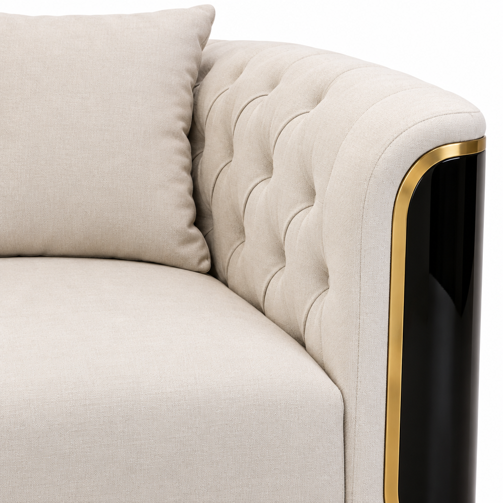 Palisandre Loveseat cream button tufting, black arm panel and gold trim close-up