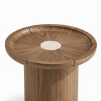 Westvale End Table on a white background, close-up detail of round tabletop, center opening, seams, and wood grain