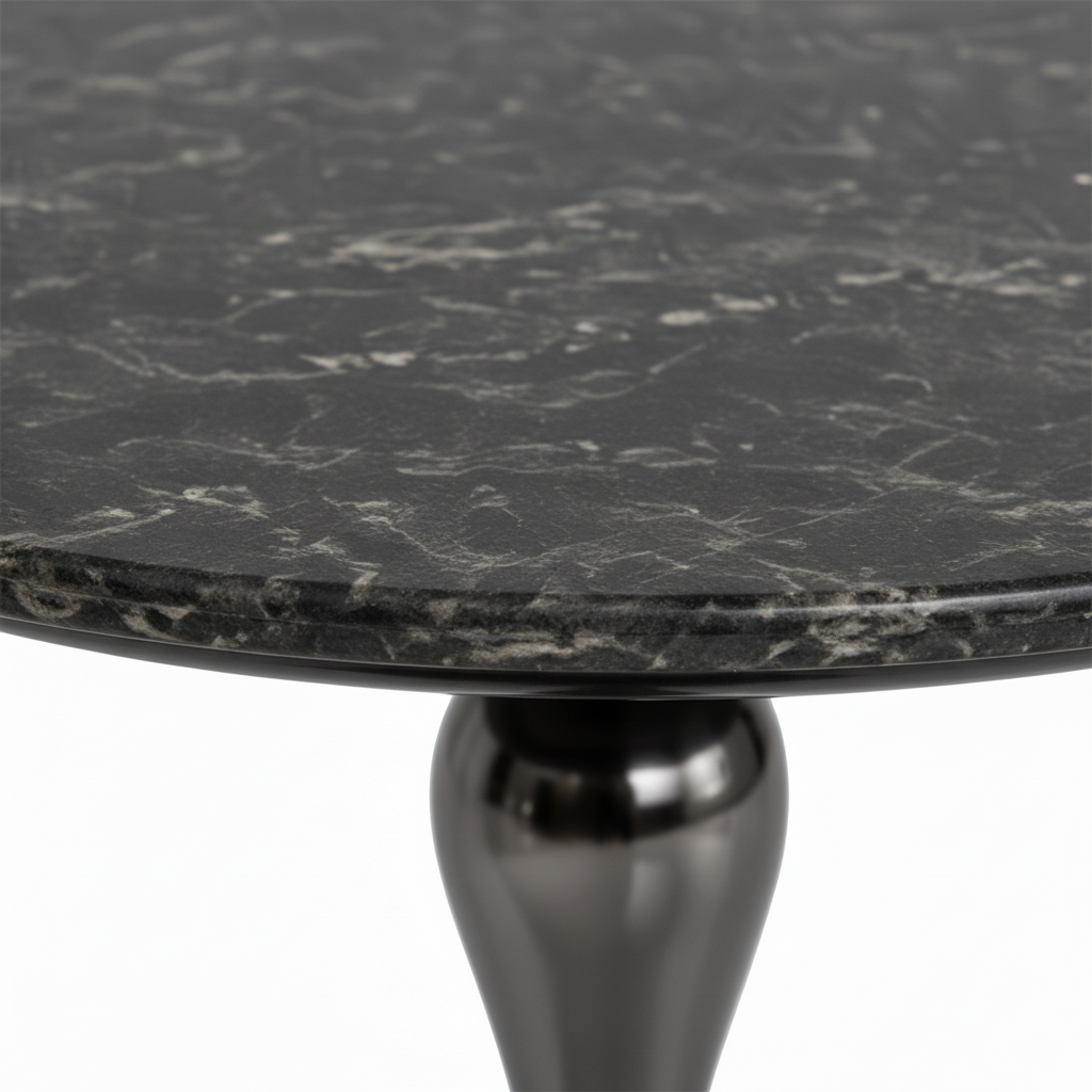 Close-up of the natural dark stone tabletop and edge on the Jervain End Table
