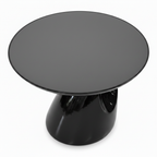 Ismeron Decor overhead view showing the round gray tabletop and glossy black sculptural base beneath.