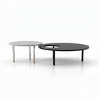 Rensaro End Table on a white background, right-front view of the black and white nesting tables