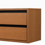 Vascelle Chest solid wood grain close-up showing the drawer reveals and right front corner.