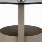 Close-up of the saddle-leather base, stitching, and curved support on the Lorisse End Table