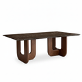 Delacroix Marble Dining Table 45-degree view, dark marble top and curved wood pedestal