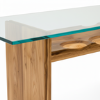 Close-up of Rensaro Dining Table wood leg and tabletop connection