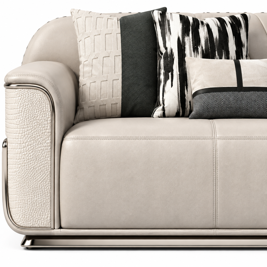 Ardellon Sofa ivory leather cushion, patterned pillow and arm trim close-up