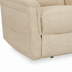 Close-up of the light beige upholstered base and dark bottom foot on the Vaudelle fabric accent chair.
