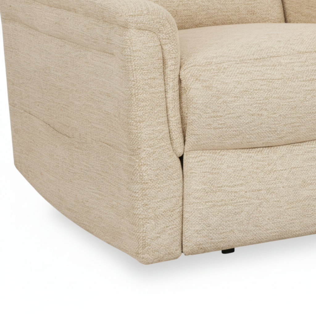 Close-up of the light beige upholstered base and dark bottom foot on the Vaudelle fabric accent chair.