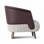 Mavero accent chair left-side view with opening facing right, plum brown leather and white boucle