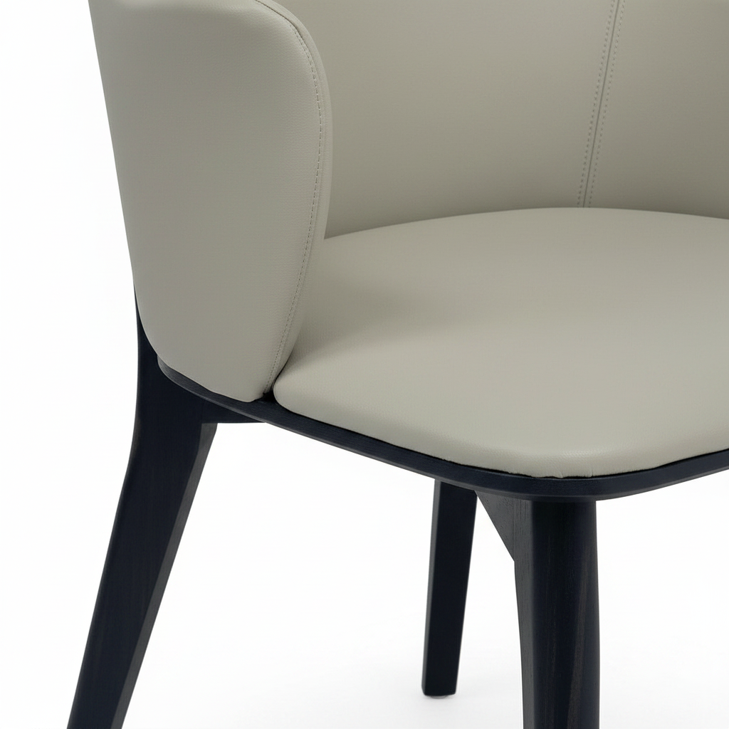 Julienne Dining Chair light greige seat cushion and black wood leg detail on white background