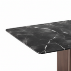 Seraphine Marble Dining Table black marble surface, veining, and rounded edge detail