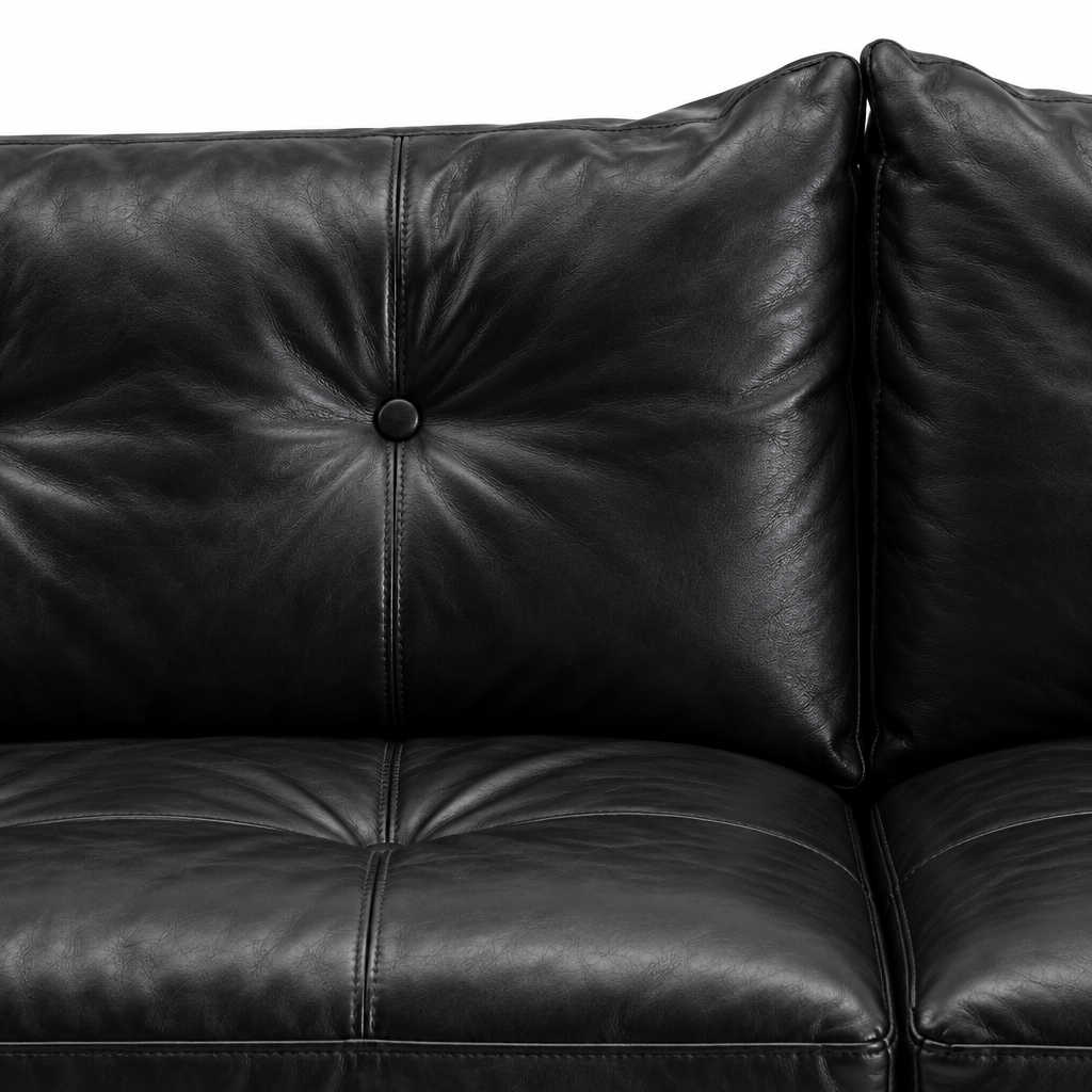 Liorenzo Sofa black leather tufted back cushion and button close-up