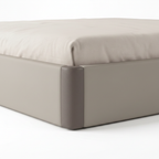 Iveronne Bed close-up of footboard and side rail frame detail on a white background