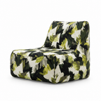 Jovienne Accent Chair with green, black, and cream patterned upholstery, shown with the seat opening facing left on a white background.