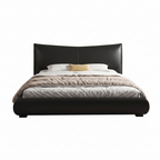 Oberon Bed straight-on front view with black upholstered footboard, white bedding, beige throw, and pillows