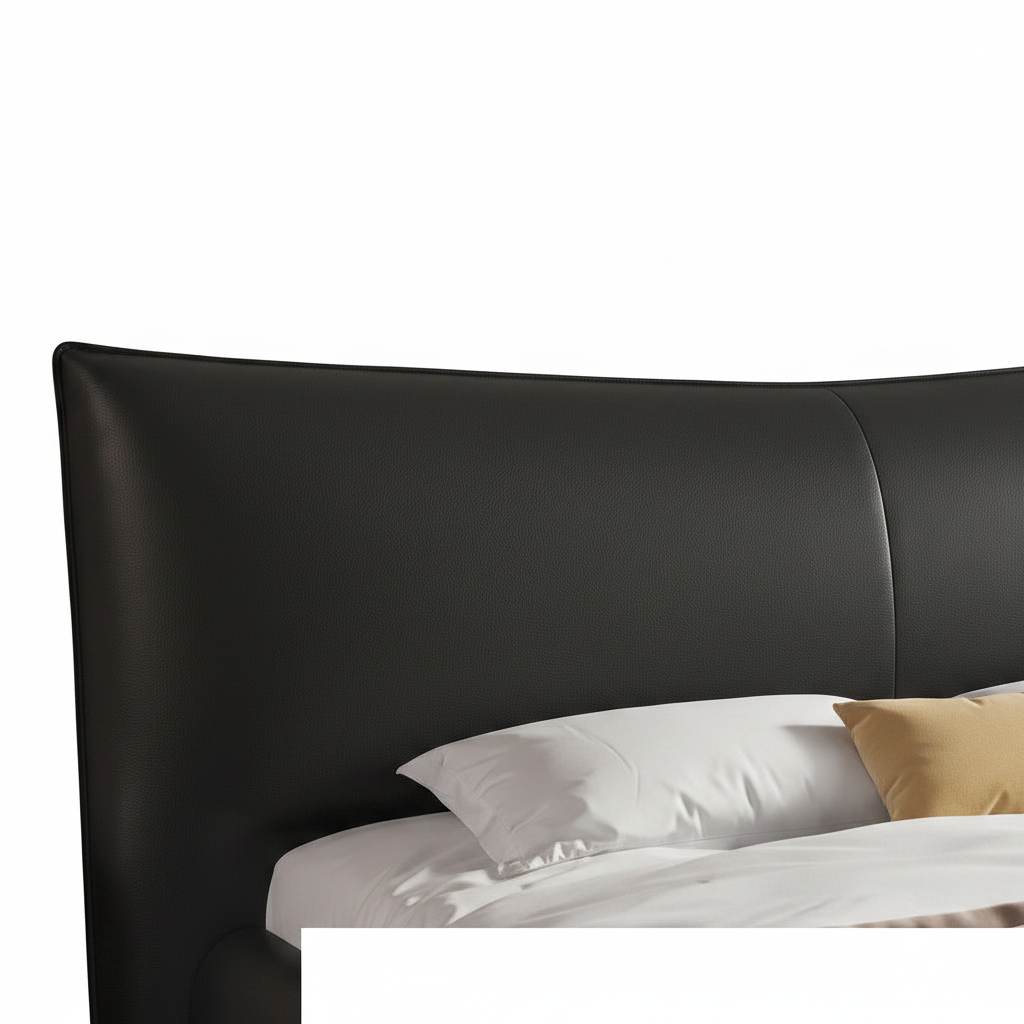 Oberon Bed right-side view with black upholstered frame, white bedding, beige throw, and curved headboard