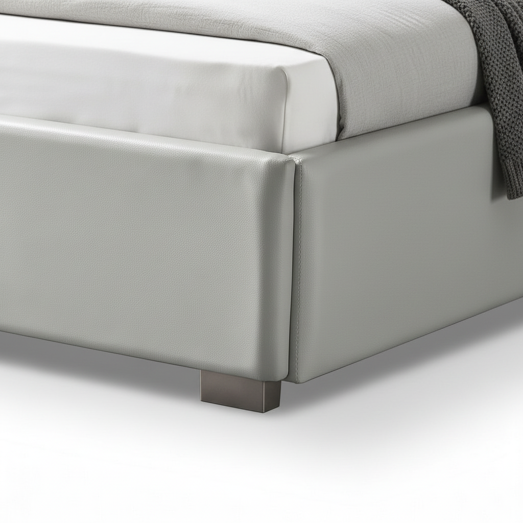 Quivelle Bed close-up of lower base detail on a white background