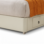 Renshaw Bed close-up of base and bed foot on a white background