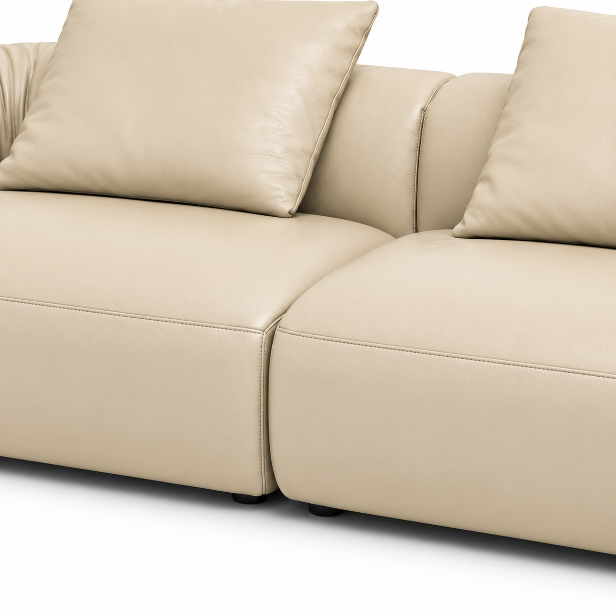 Rosvane Leather Sofa — visible seat cushions, their seams, and the lower front base beneath them (detail edited from existing product photo)