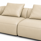 Rosvane Leather Sofa — visible back cushions, decorative pillows and upholstery stitching (detail edited from existing product photo)