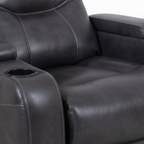 Roussane Power Leather Accent Chair close-up of black leather upholstery and stitched detail on a white background