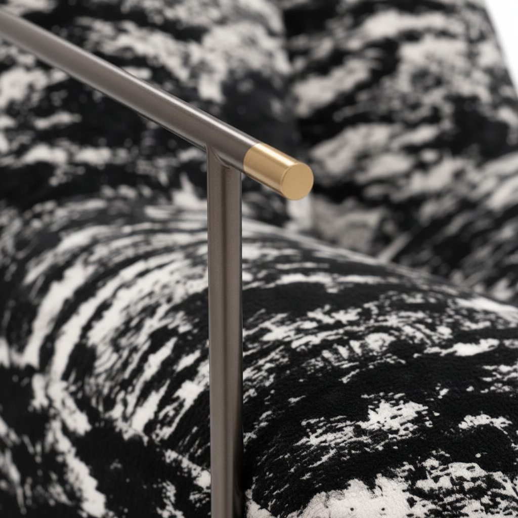 Sorellea Accent Chair metal armrest detail showing the curved support structure and upholstered seat.