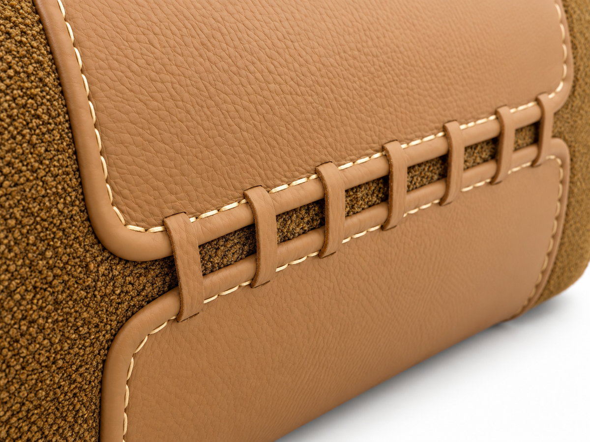 Valetto Saddle Ottoman genuine-leather grain and stitched loop detail