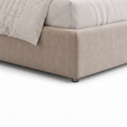 Vaudrec Bed close-up of lower base detail on a white background