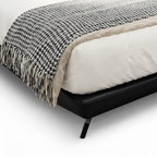 Wycliffe Bed close-up of lower base and support feet detail on a white background
