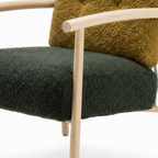 Xavrin Accent Chair fabric upholstery and wood frame detail showing the texture and craftsmanship.